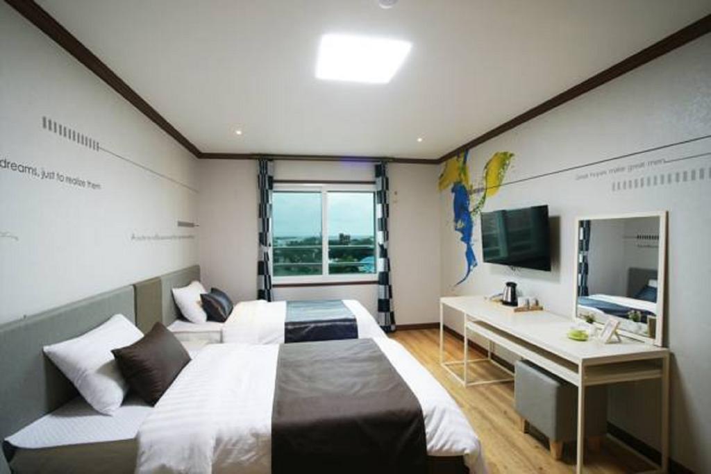 Seongsan Aqua Beach Hotel Seogwipo-stad Kamer foto