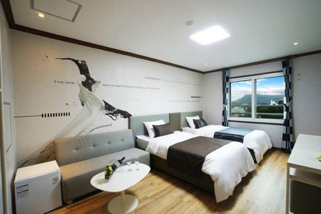 Seongsan Aqua Beach Hotel Seogwipo-stad Kamer foto