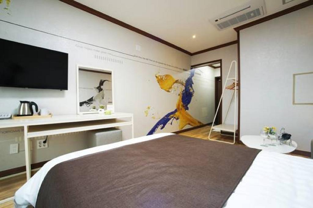 Seongsan Aqua Beach Hotel Seogwipo-stad Kamer foto